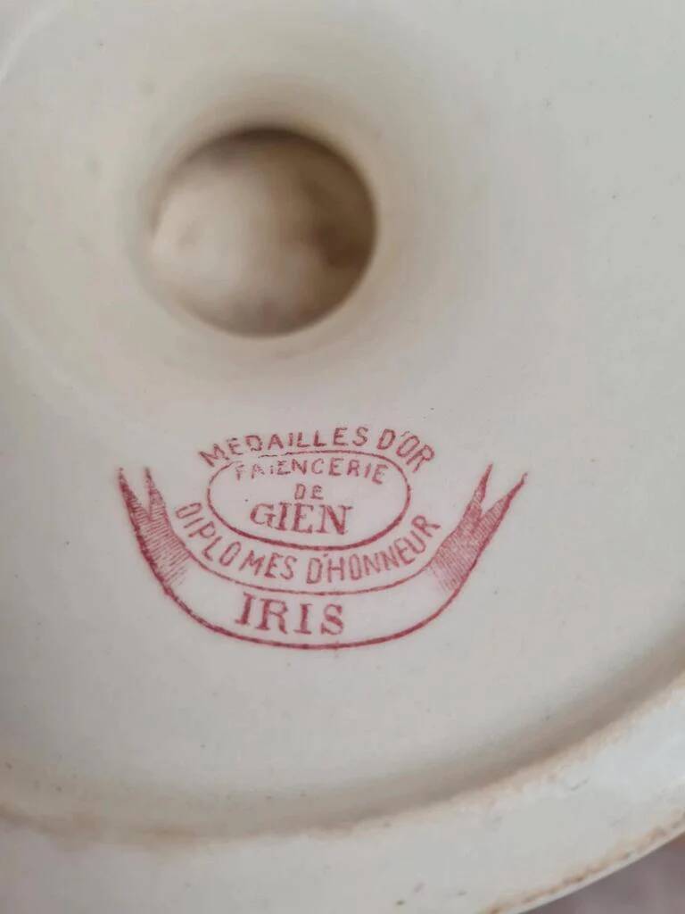 Large footed compote Gien model Iris with red floral decoration.