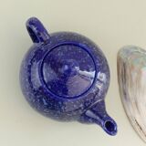 Blue glazed and speckled ceramic teapot