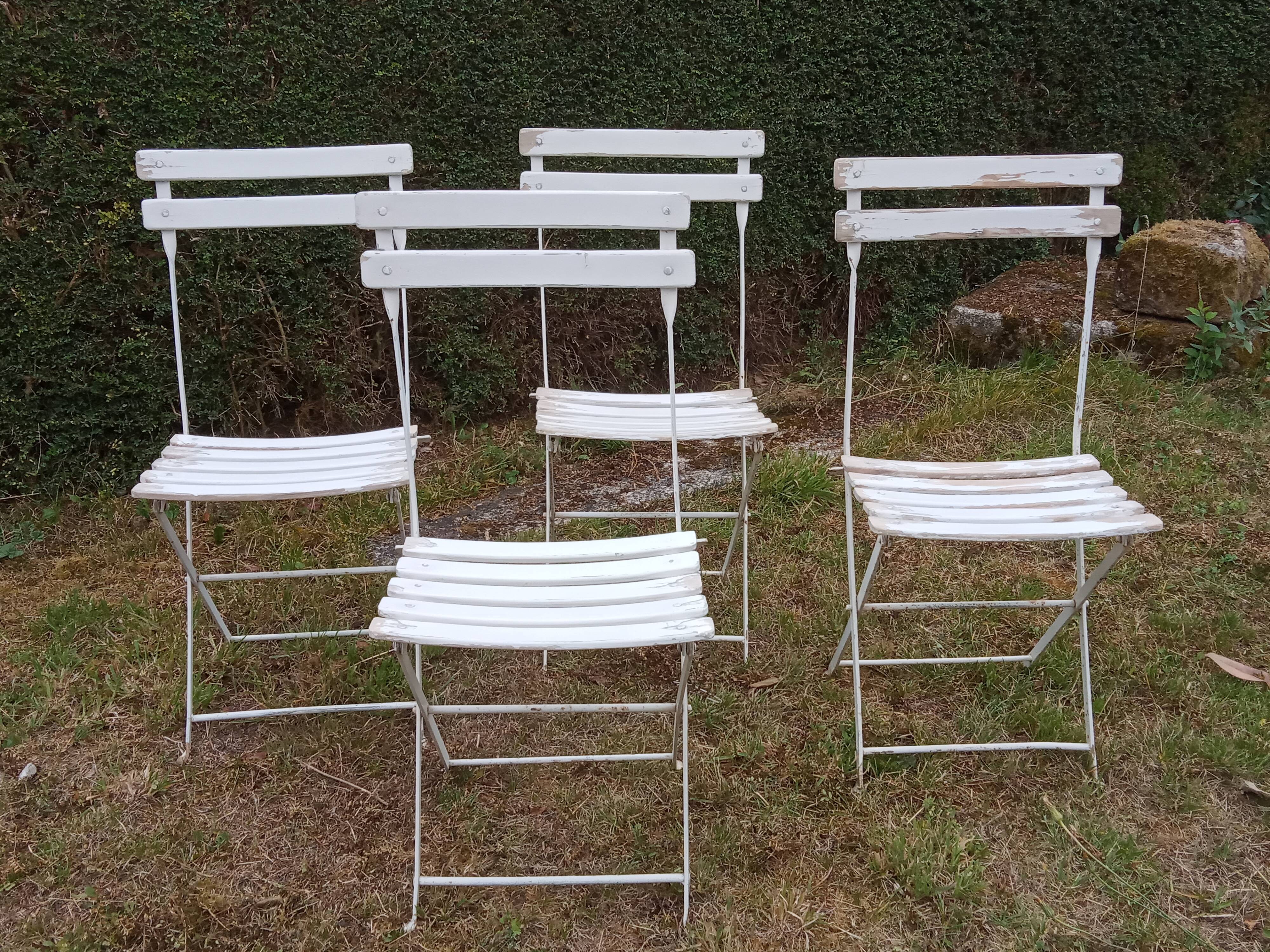 Four old garden chairs