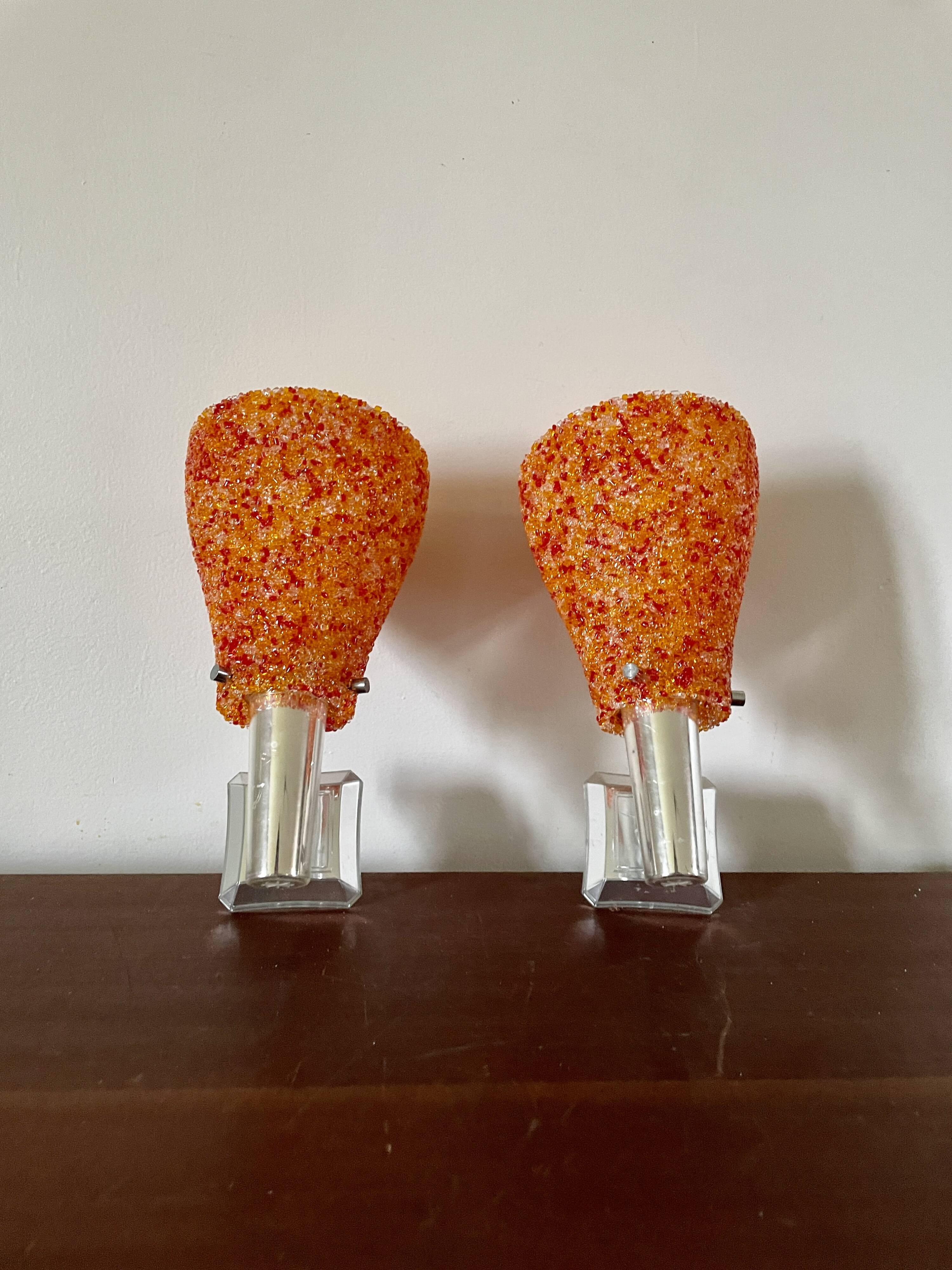 Pair of orange perspex wall lights from the 1950s.