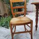 Round table, Louis Philippe style, antique patina, its 2 extensions and 4 chairs