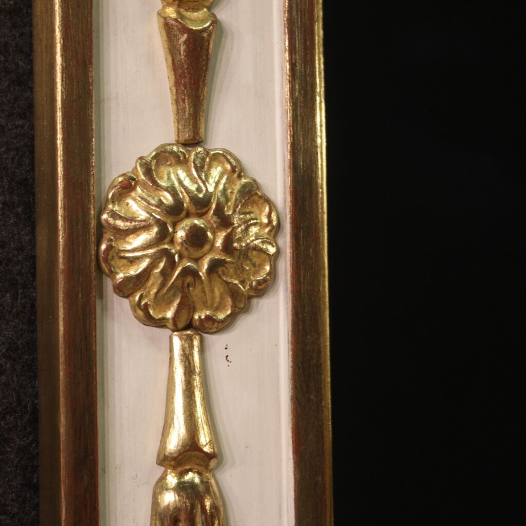 Lacquered and gilded mirror in Louis XVI style