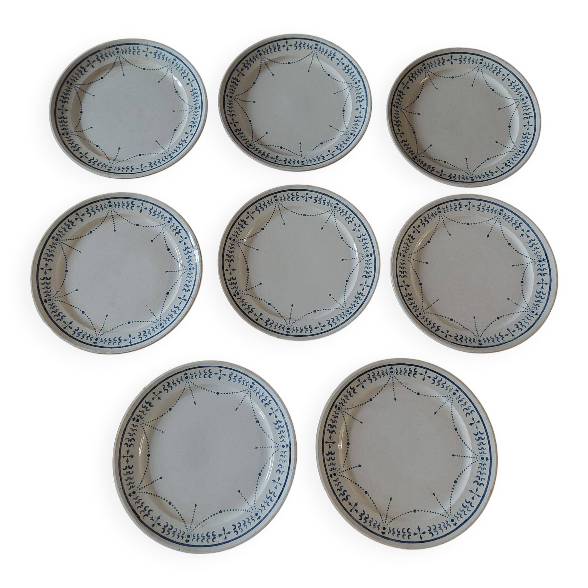 Set of eight flat plates, ironstone, Géon Rouard, Lille decoration, years.