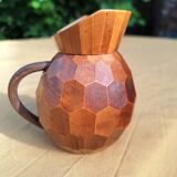 Small faceted wooden pitcher