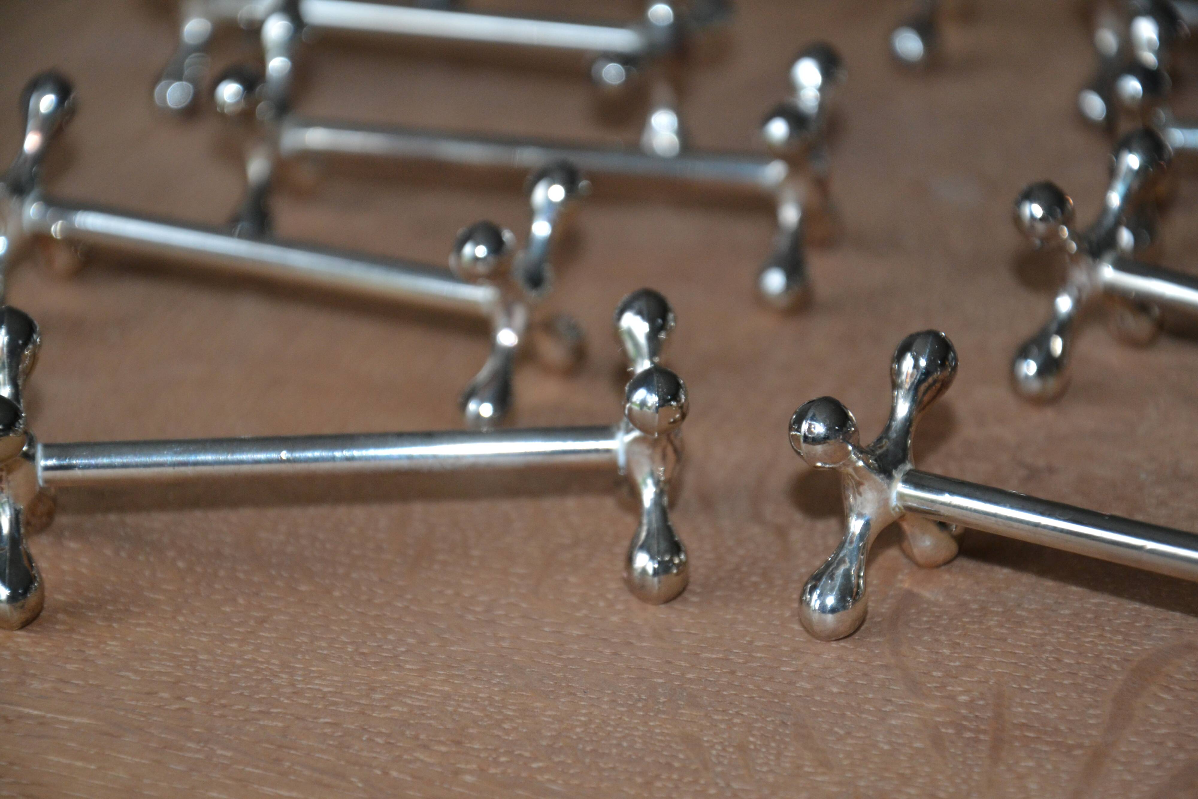 12 silver metal knife holders