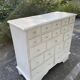 Commode en pin patiné blanc multi tiroirs