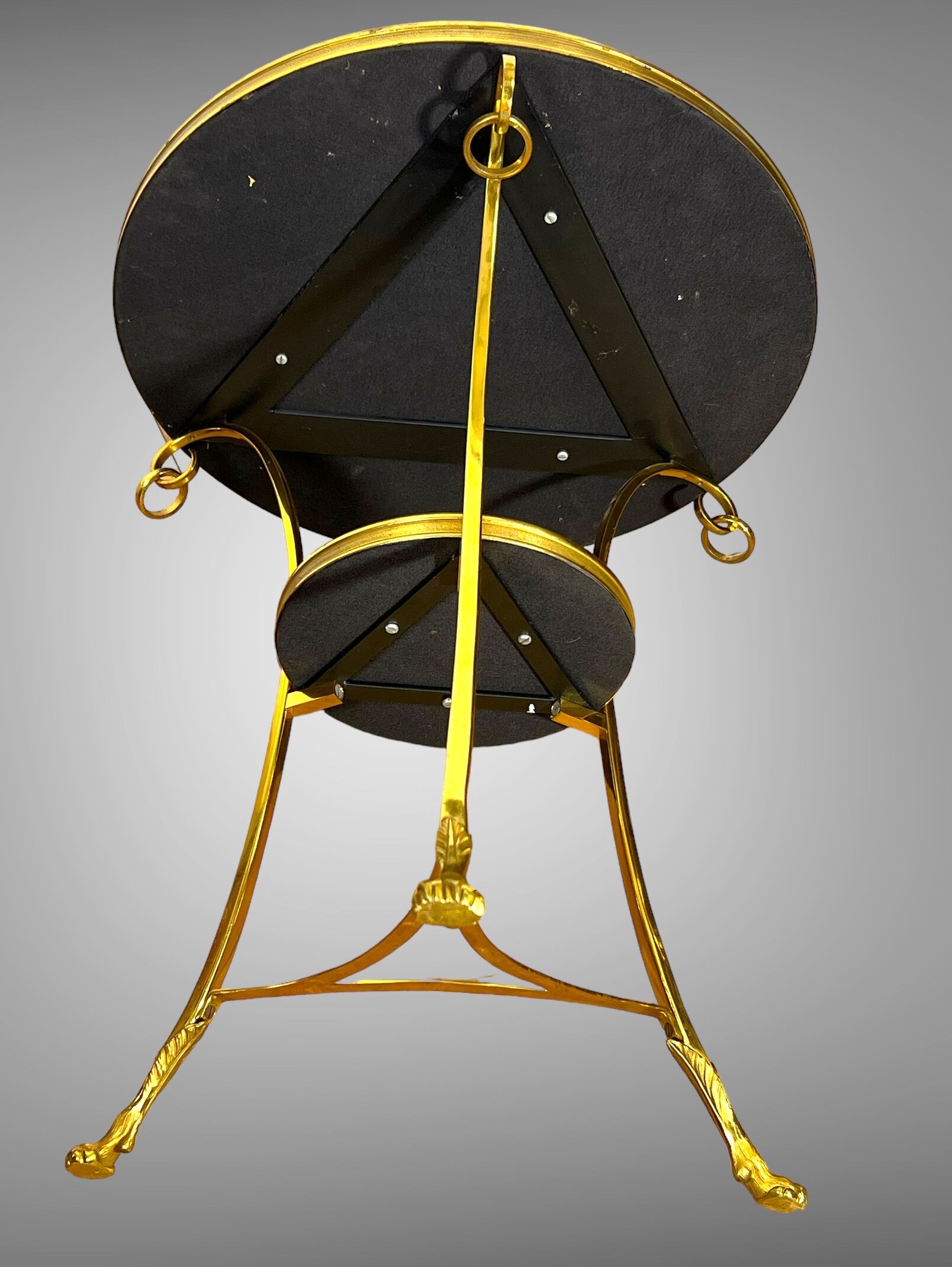 Gueridon tripod with gilded bronze frame covered with portor marble
