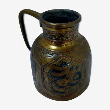 Ancient oriental pitcher
