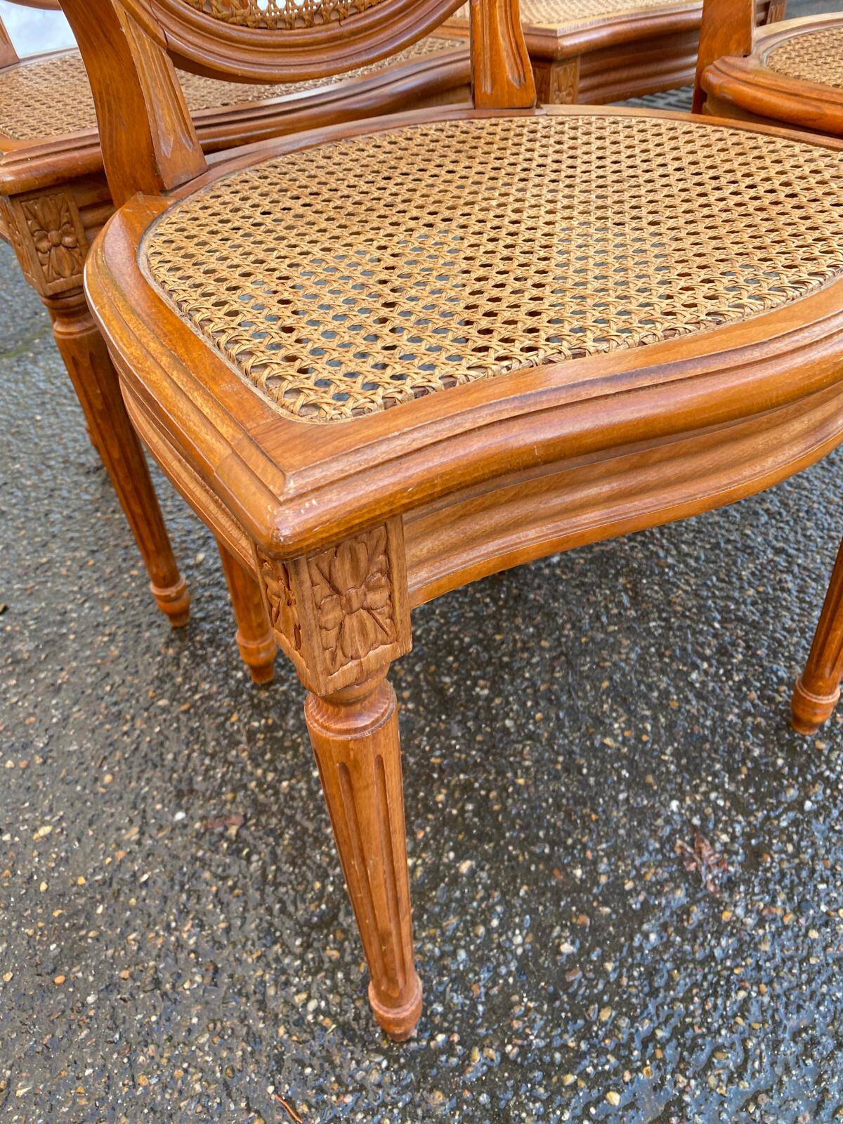 4 caned Louis XVI medallion dining chairs from the 19th century.