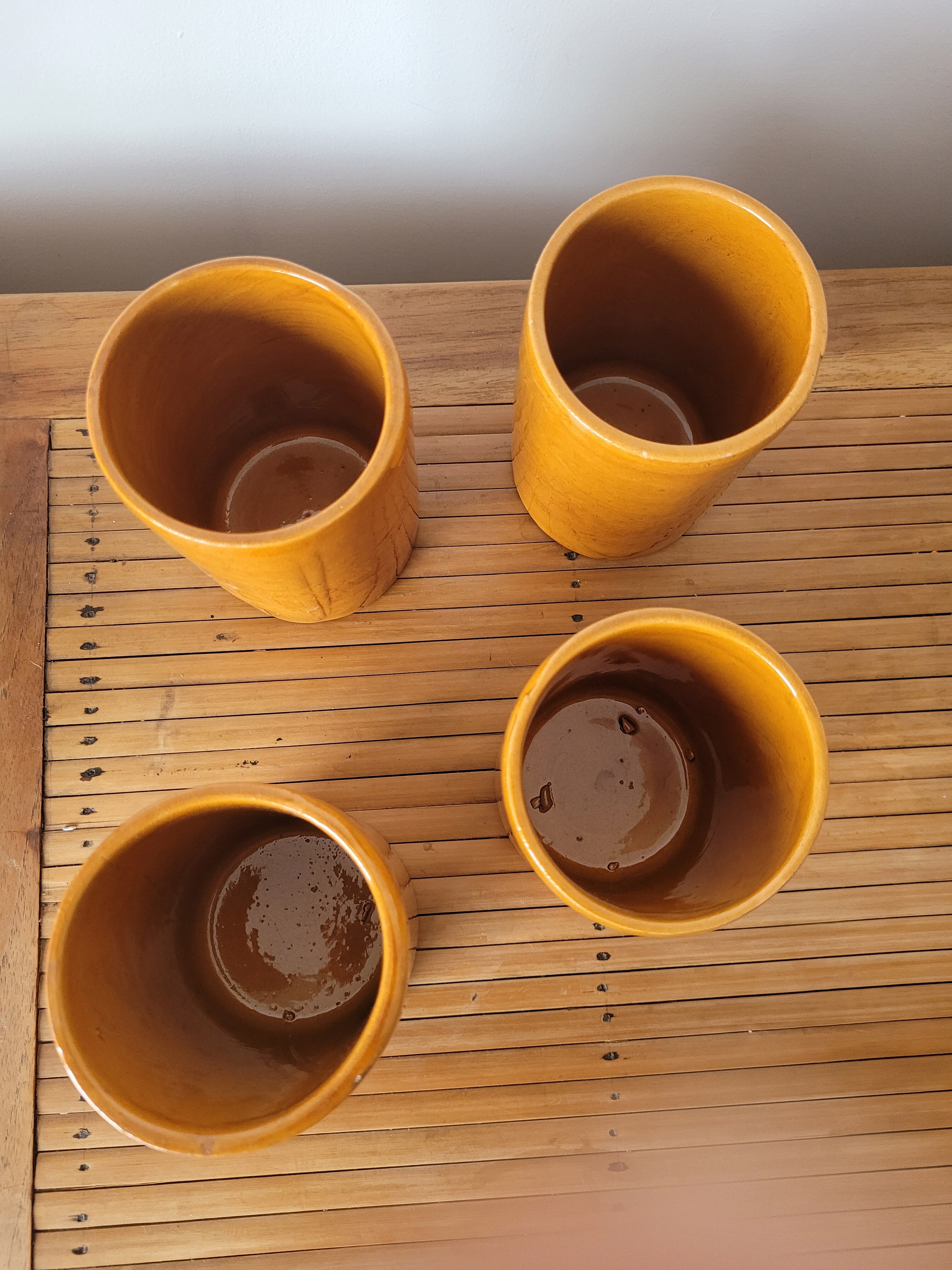 4 old glazed terracotta cups