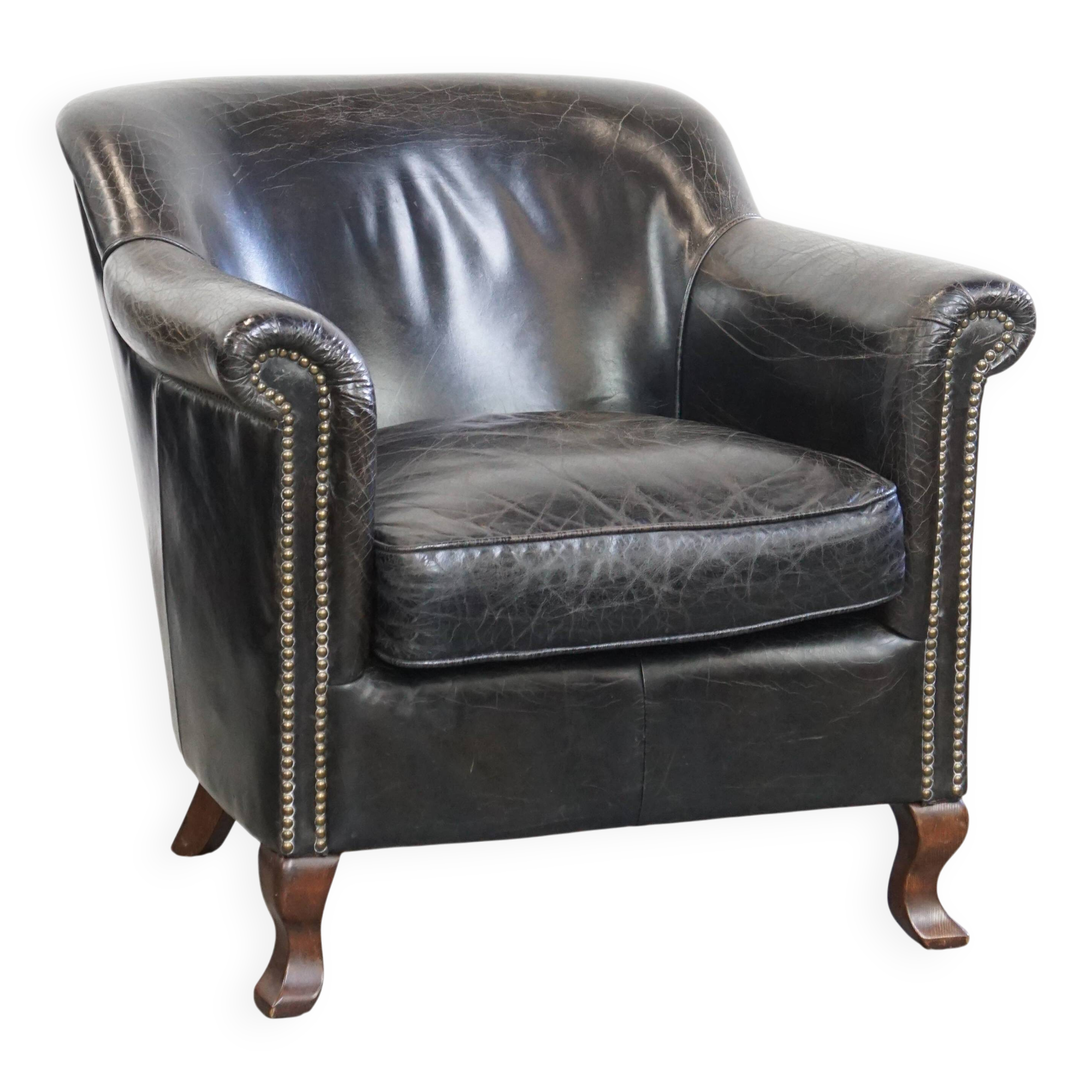 Black grained cowhide leather armchair