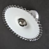 Articulated opaline pleated wall light