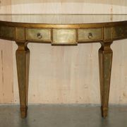 Half-moon console Eglomise Theodore Alexander with a gold finish.
