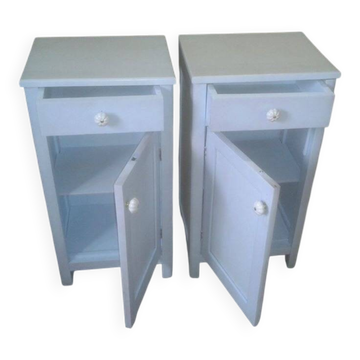 Pair of vintage blue painted wooden bedside tables, Germany 1950s, with drawer and door.