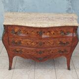 Louis XV curved chest of drawers in rosewood marquetry