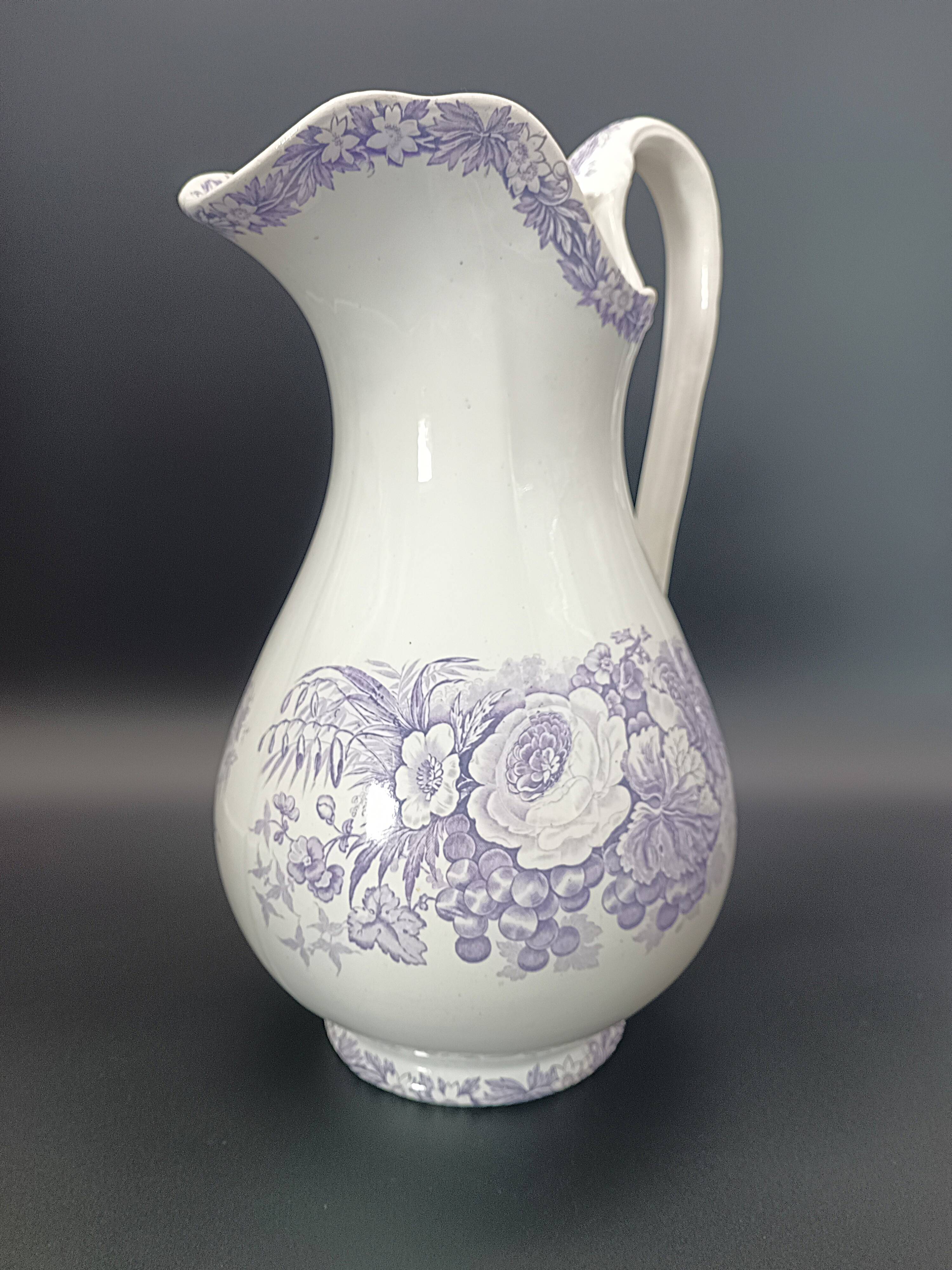 Large antique toilet bowl by Jules Vieillard Bordeaux with violet floral decoration.