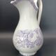 Large antique toilet bowl by Jules Vieillard Bordeaux with violet floral decoration.