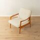 Elegant mid-century armchair from the 1960s with cream-white upholstery