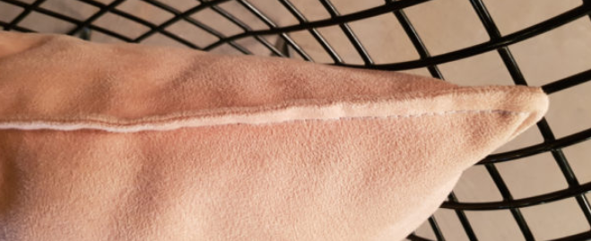 Pale pink velvet rectangle cushion