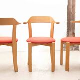 Chair upholstered in red and beech