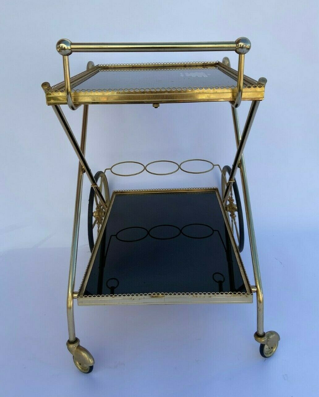 Vintage 1960's bar rolling table smoked glass gilded metal