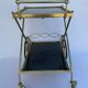 Vintage 1960's bar rolling table smoked glass gilded metal