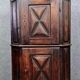 Rustic Louis XIII style corner cupboard in solid oak circa 1800