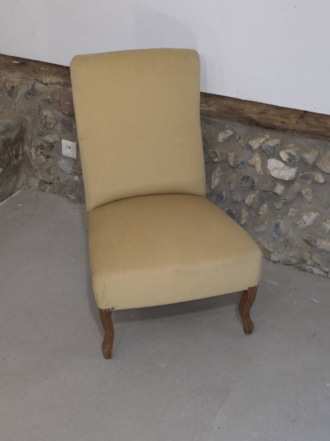 Pale yellow Napoleon III armchair