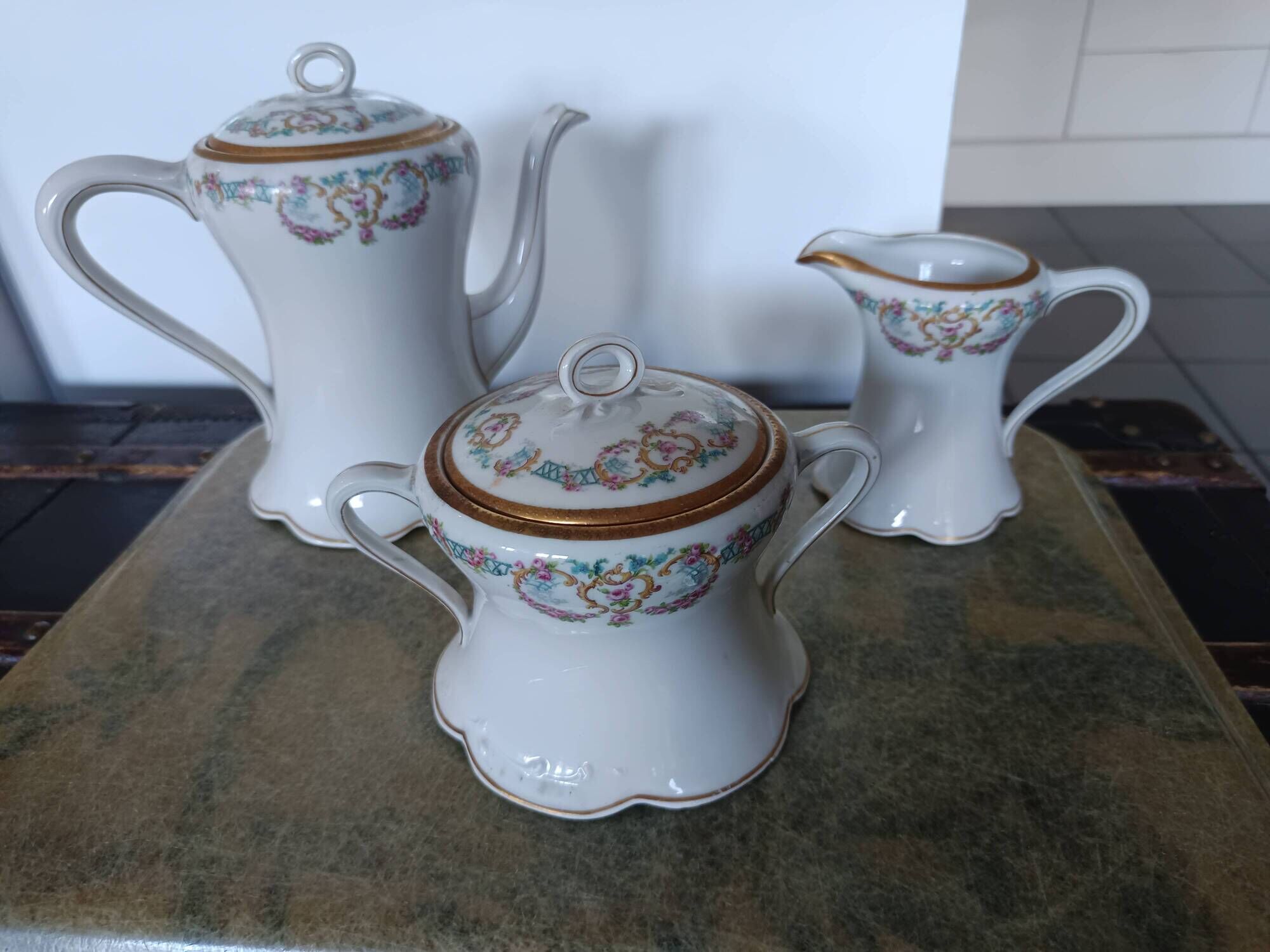 Limoges porcelain service – Lewis Straus & Sons – gold floral decoration