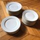 Lot of 28 porcelain plates with golden edging