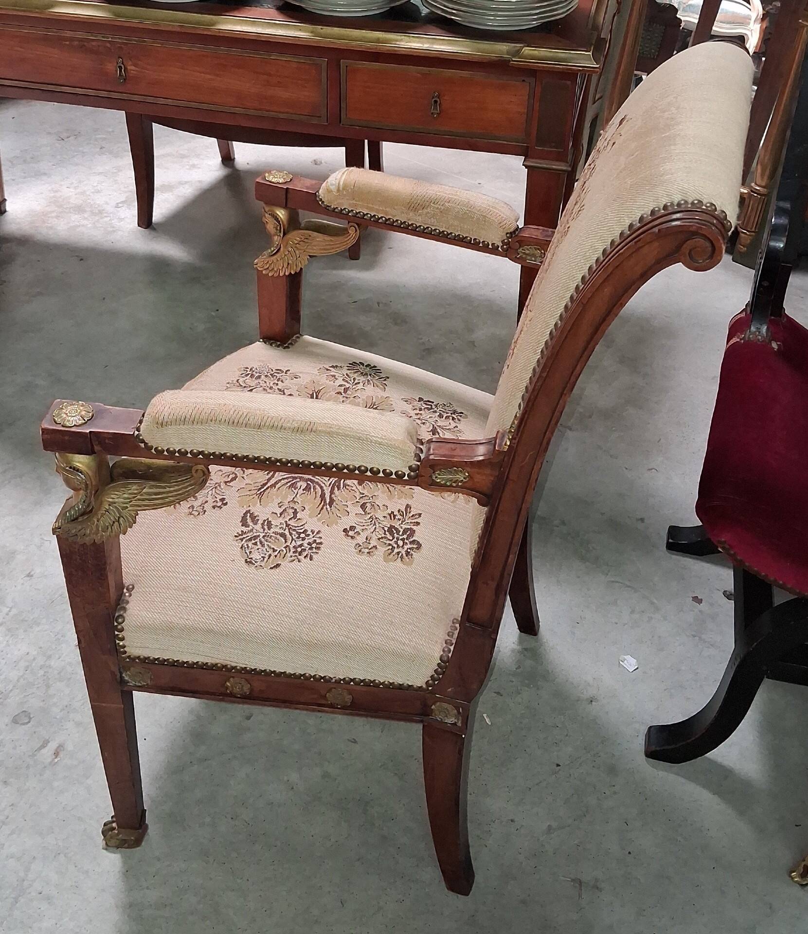 Fauteuil époque Empire en acajou à têtes d'égyptiennes, début XIXe siècle