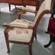 Fauteuil époque Empire en acajou à têtes d'égyptiennes, début XIXe siècle