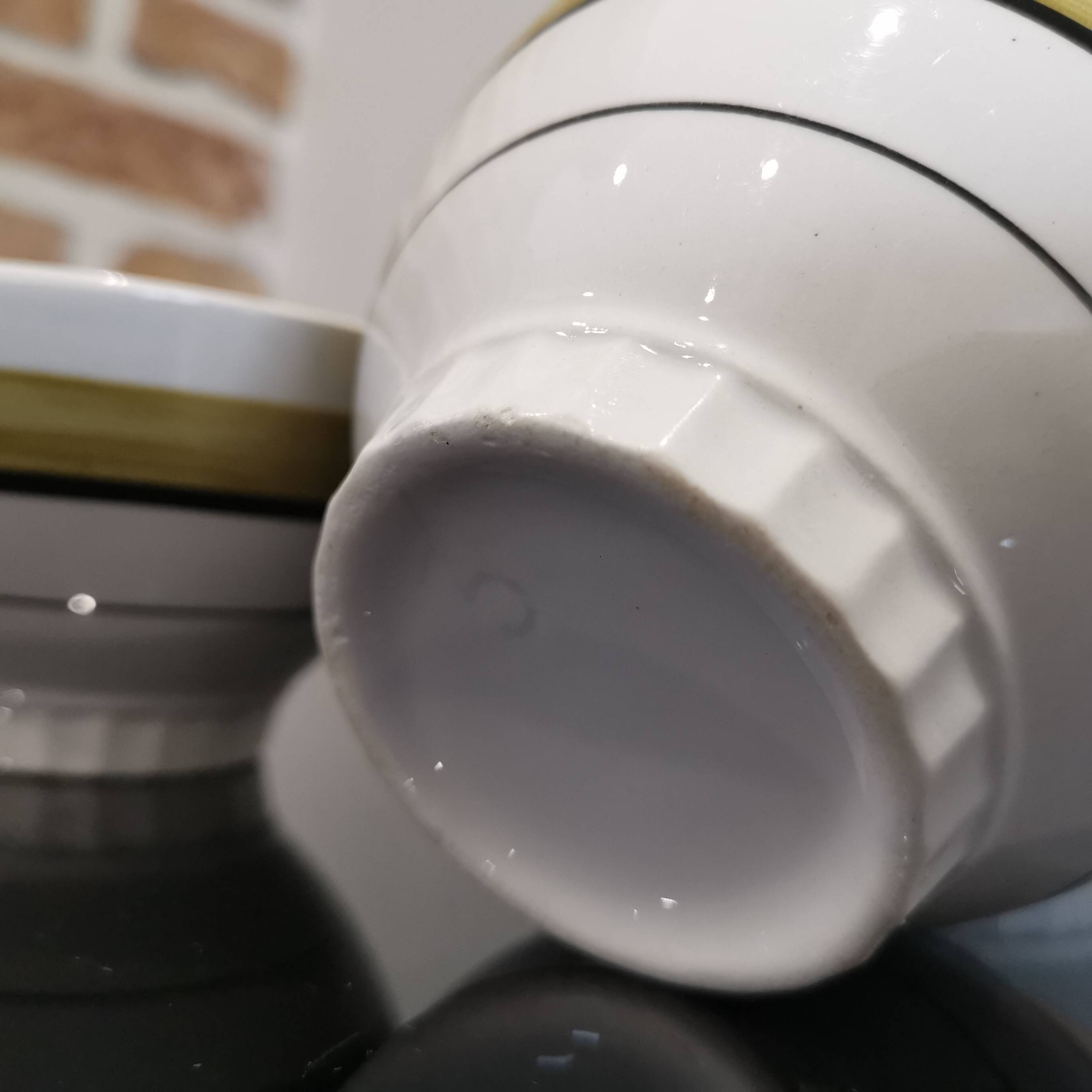 Series of 5 small old earthenware bowls with olive green edging