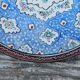 Decorative plate in blue enameled metal with bird motifs