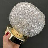 wall light composed of a vintage globe