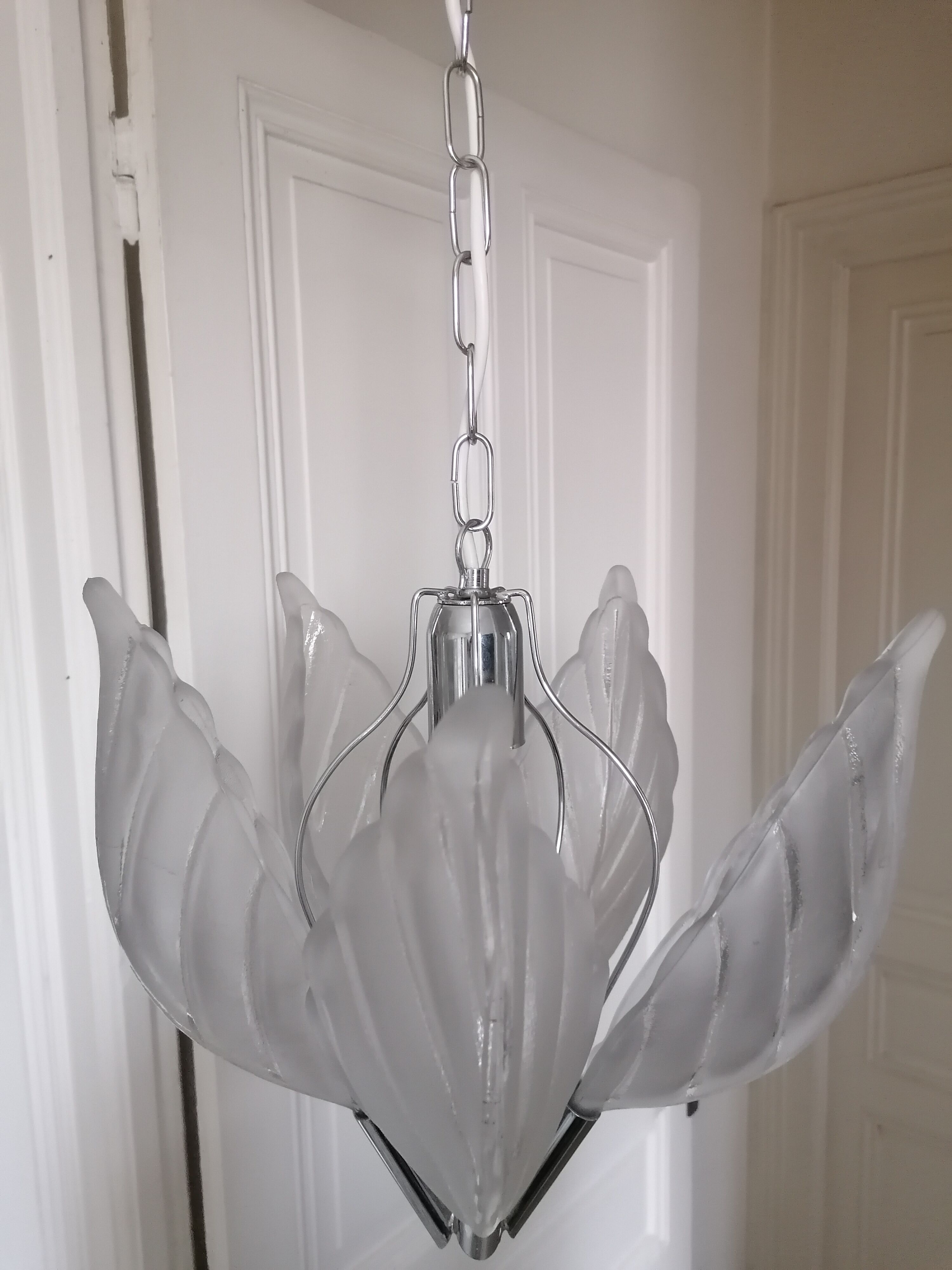 Chrome metal chandelier and glass plate