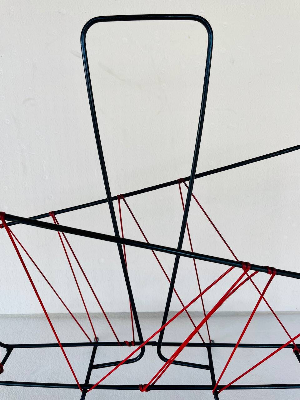 Vintage black metal magazine rack circa 19