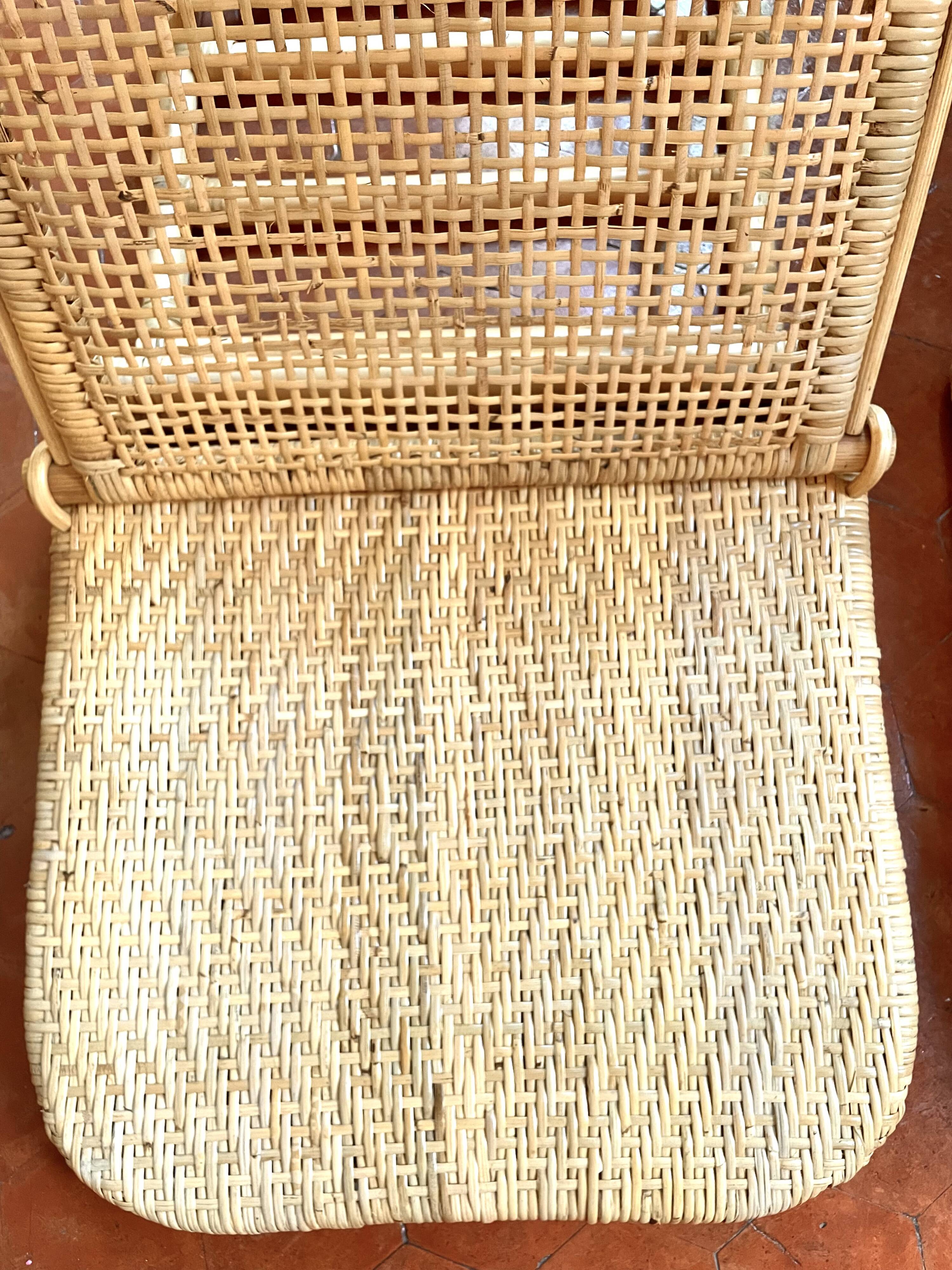Paire de fauteuils pliables  en rotin