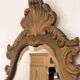 Bakelite scrolled mirror with rocaille pediment
