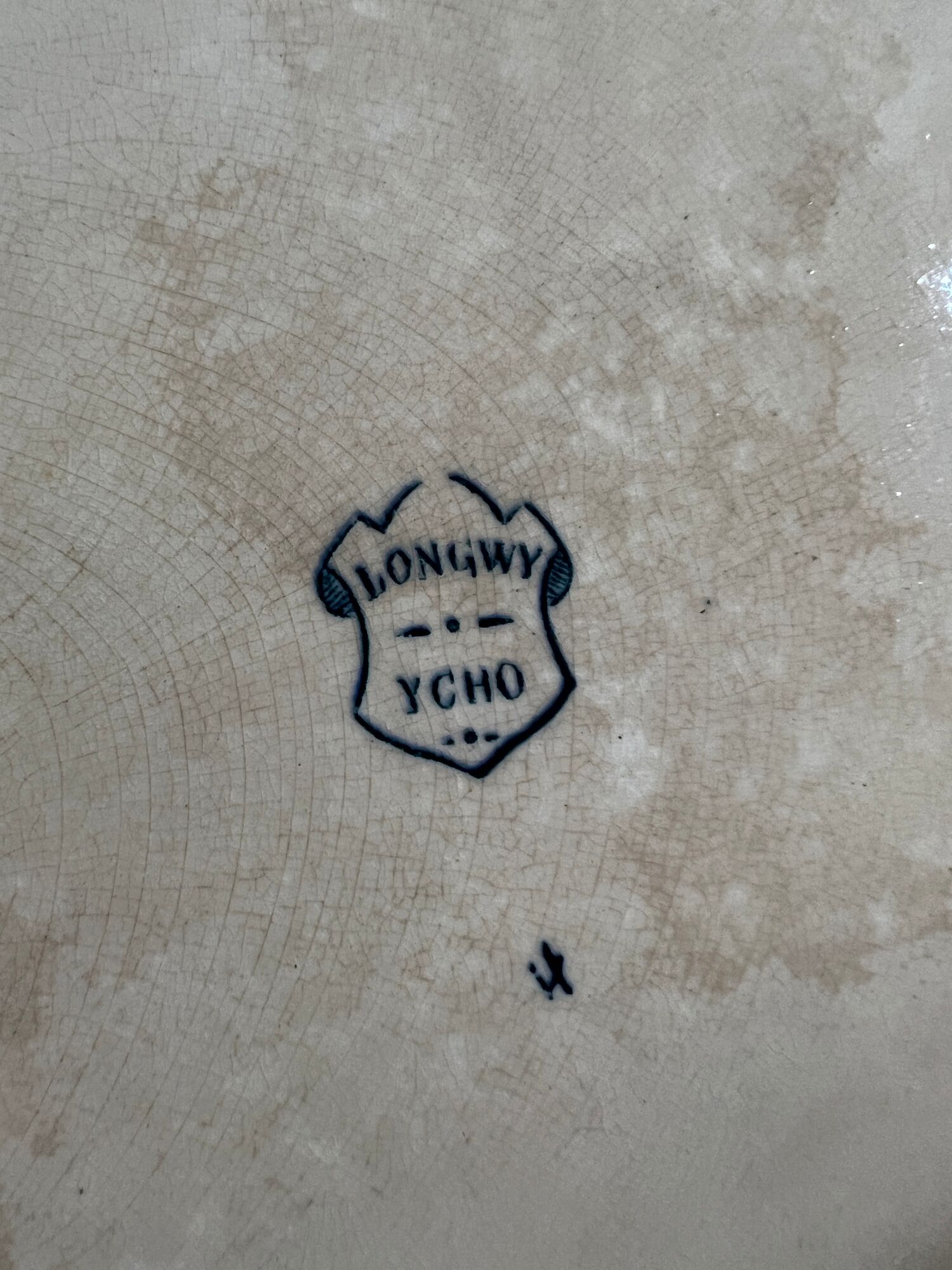 Plat ovale en porcelaine longwy signé yeho