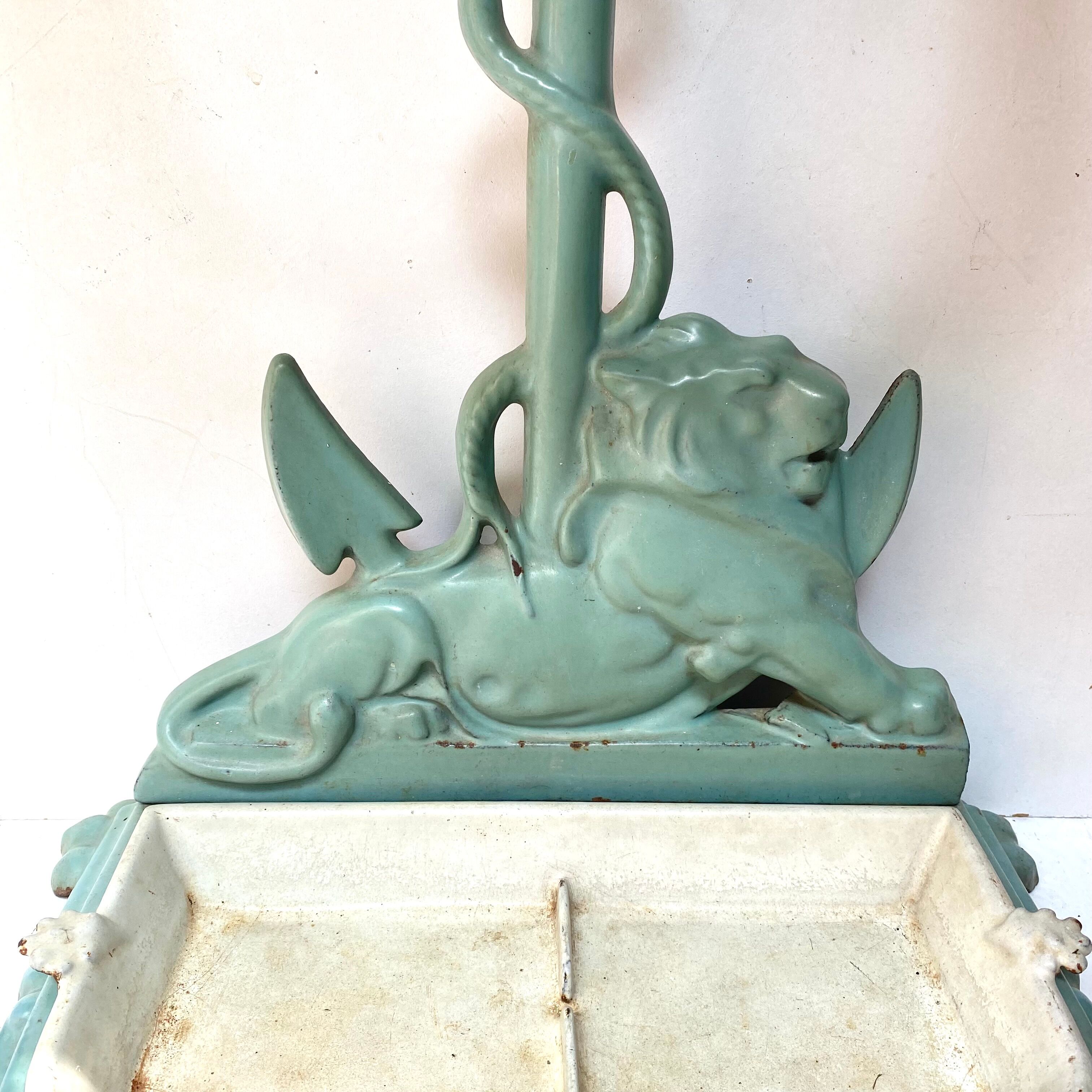 Enameled cast iron umbrella stand from the early 20th century