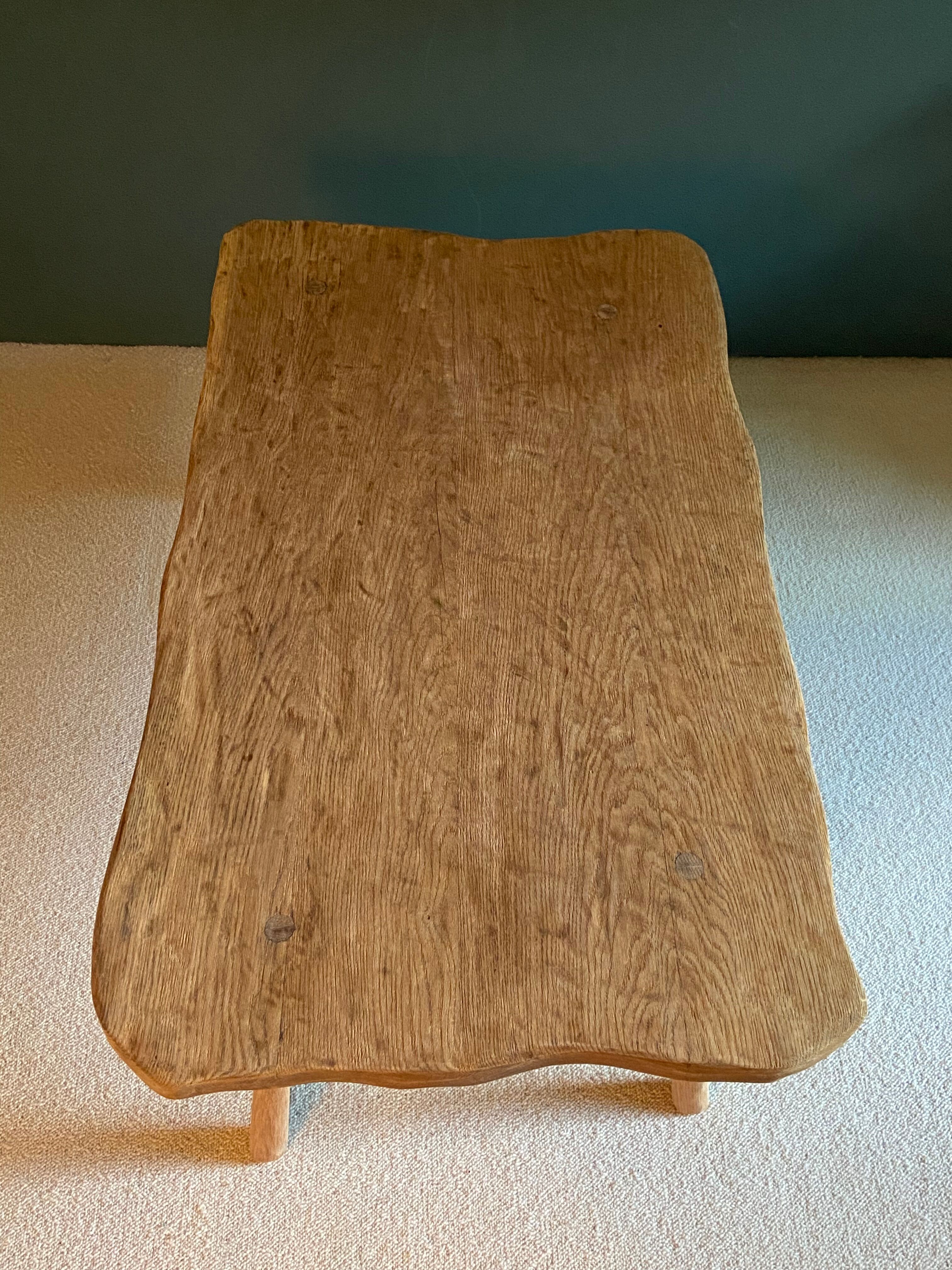 Free-form raw wood coffee table