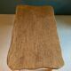 Table basse en bois brut de forme libre