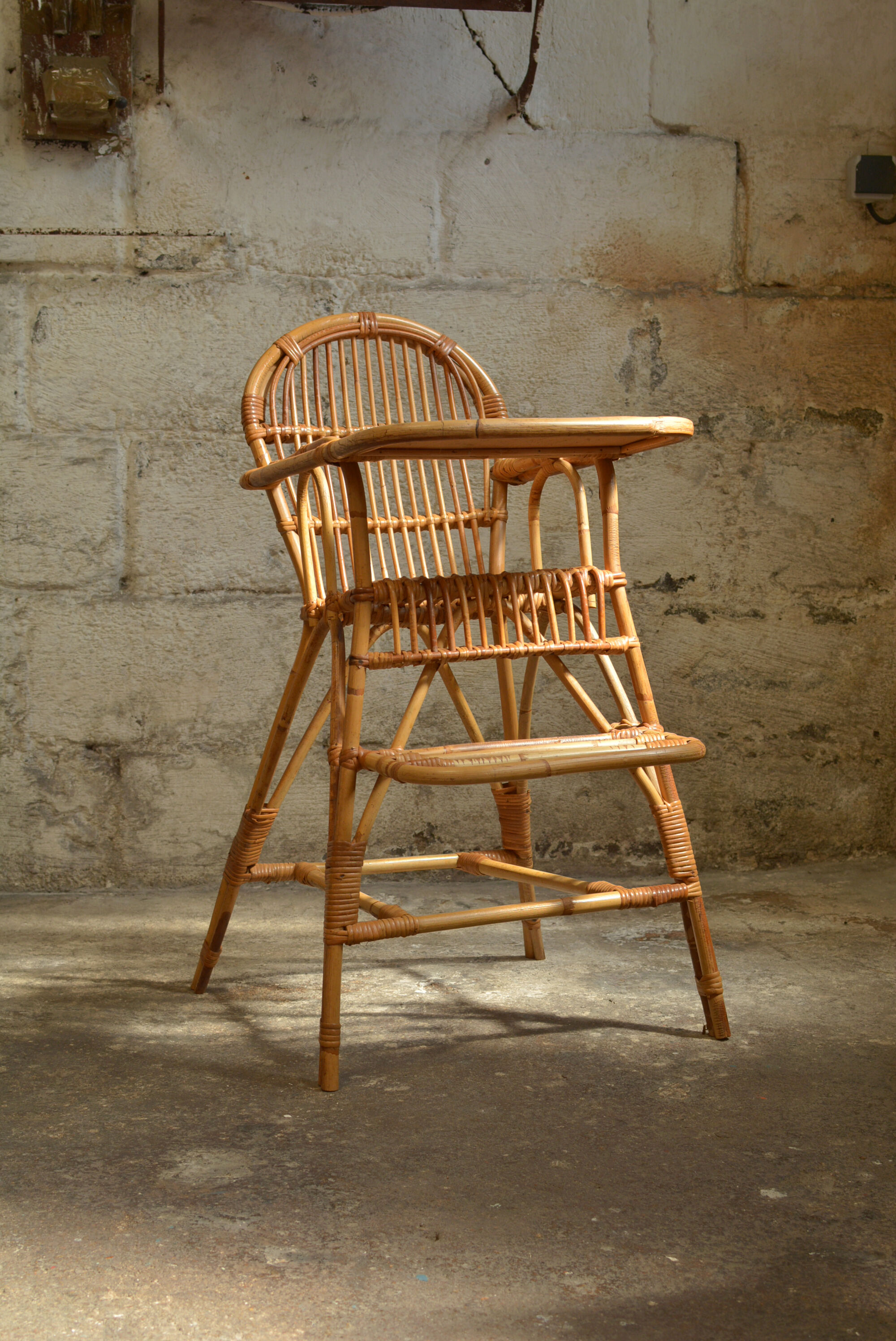 Vintage rattan high chair