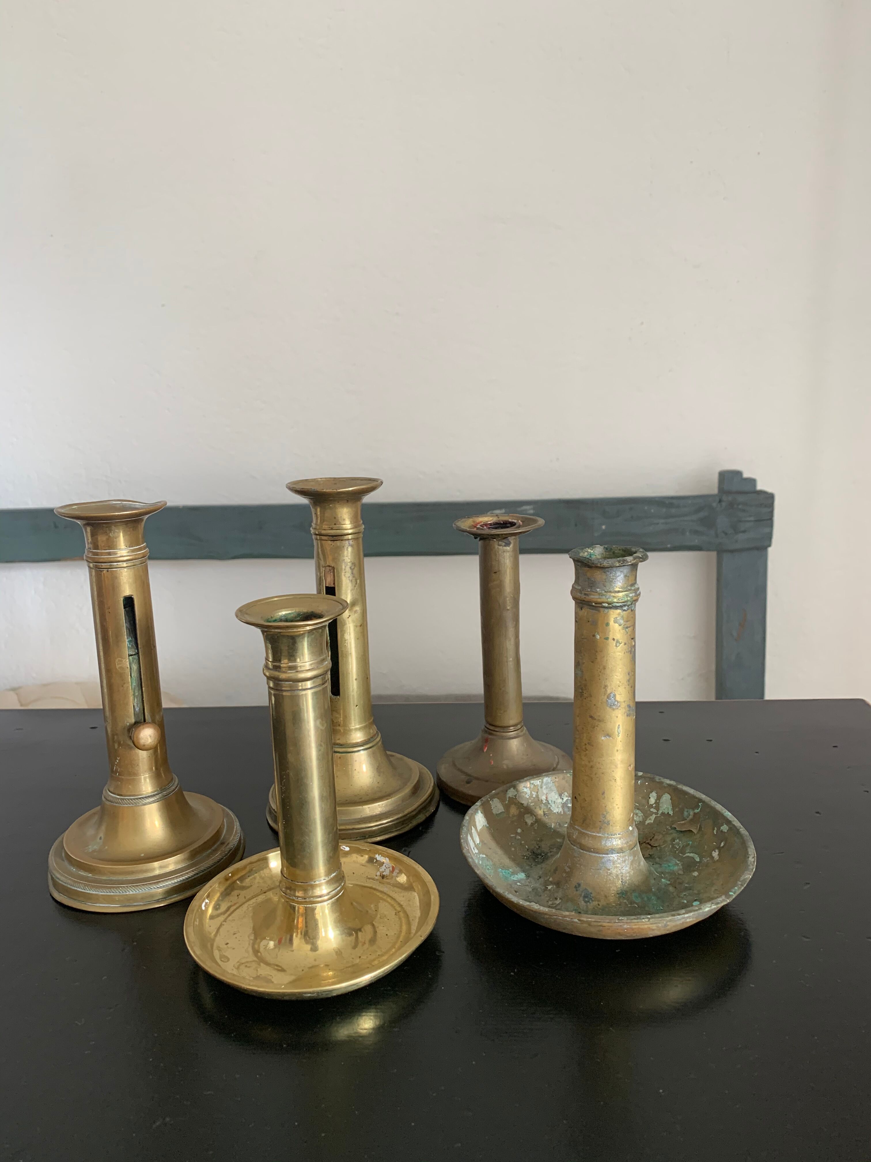 Set 5 vintage brass candlesticks