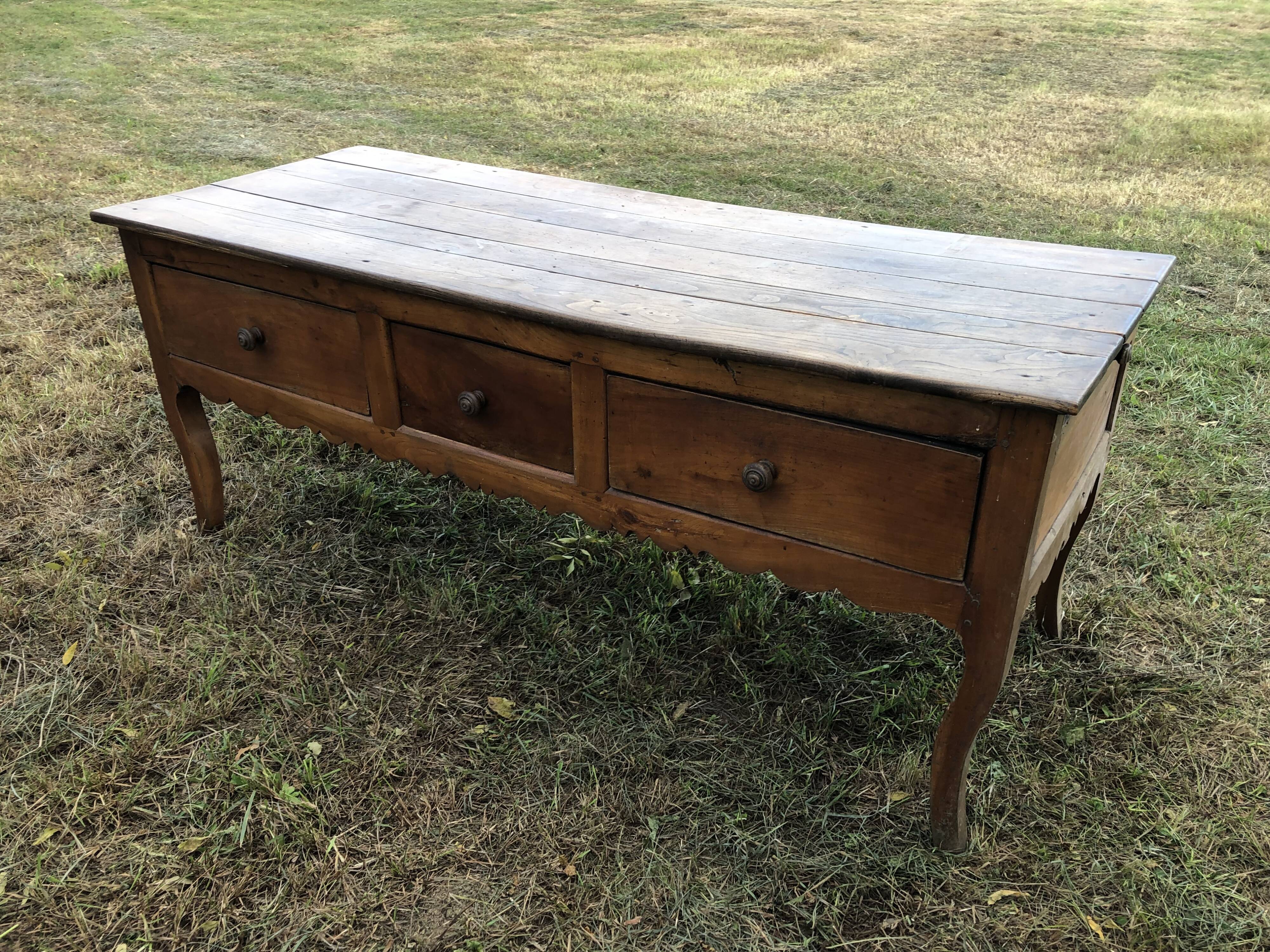 Antique Louis XV paneled table with 3 front drawers in solid cherry wood