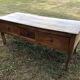 Antique Louis XV paneled table with 3 front drawers in solid cherry wood