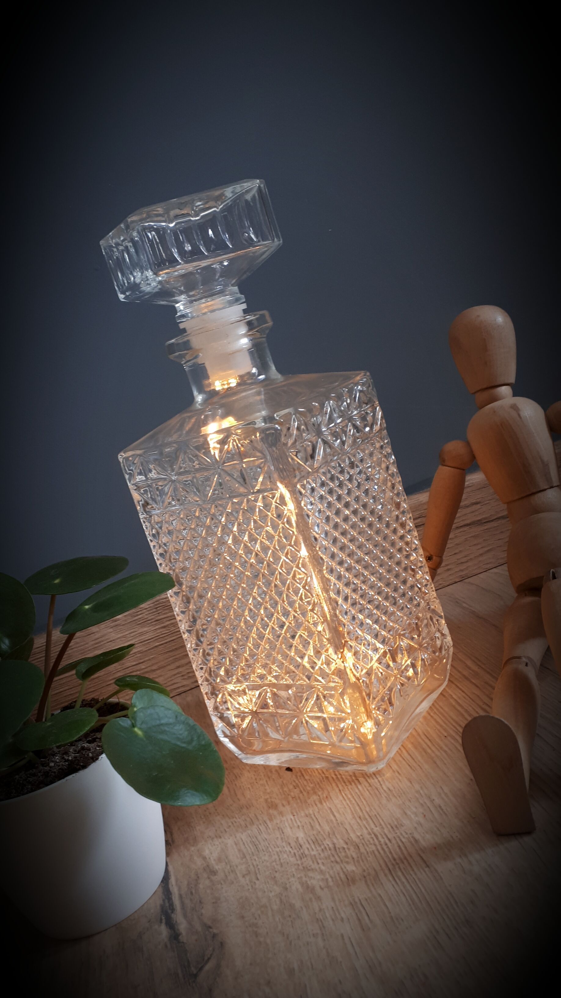 Old whisky carafe in relief glass