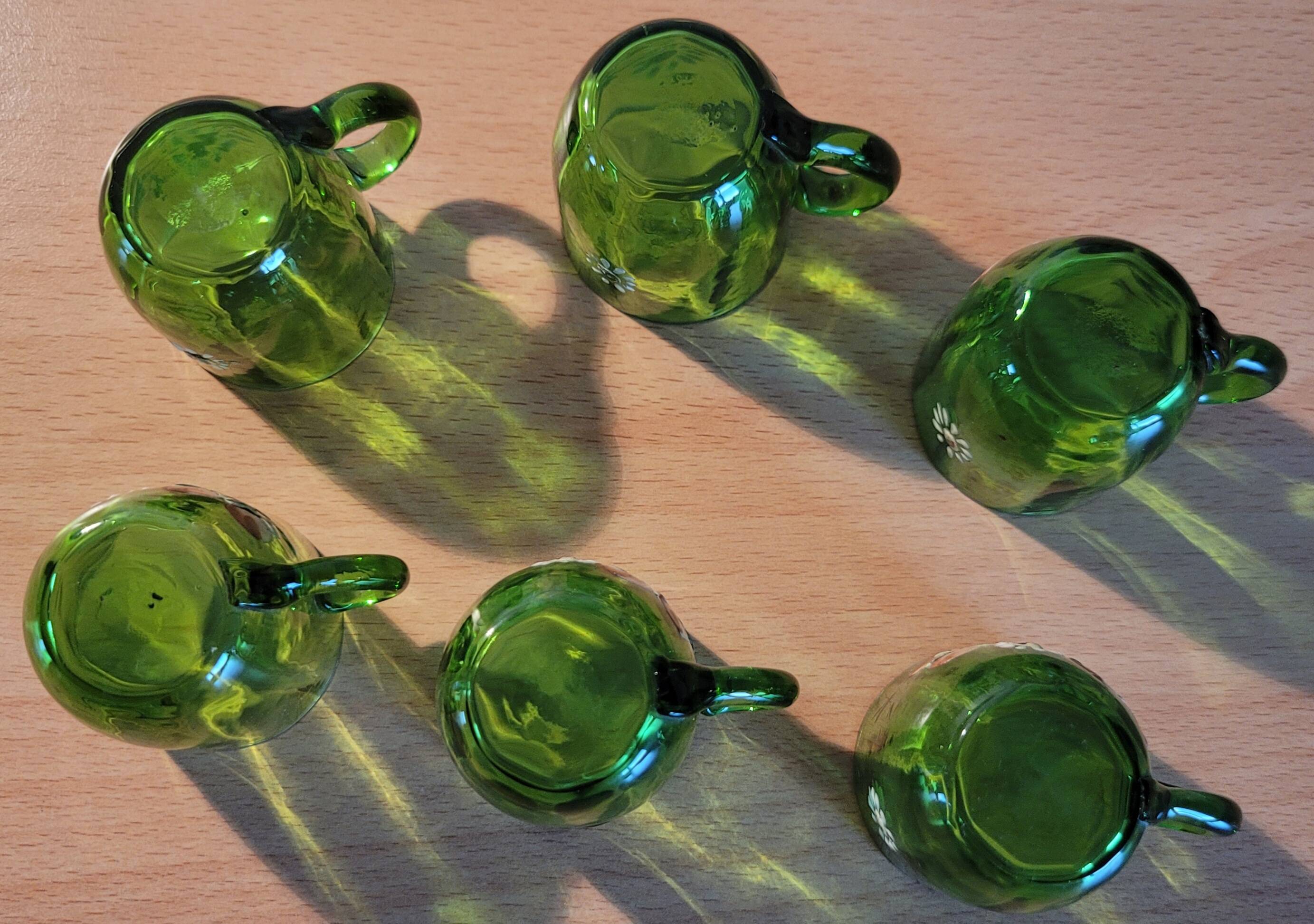Set of 6 dark green liqueur glasses with handle and floral decoration.