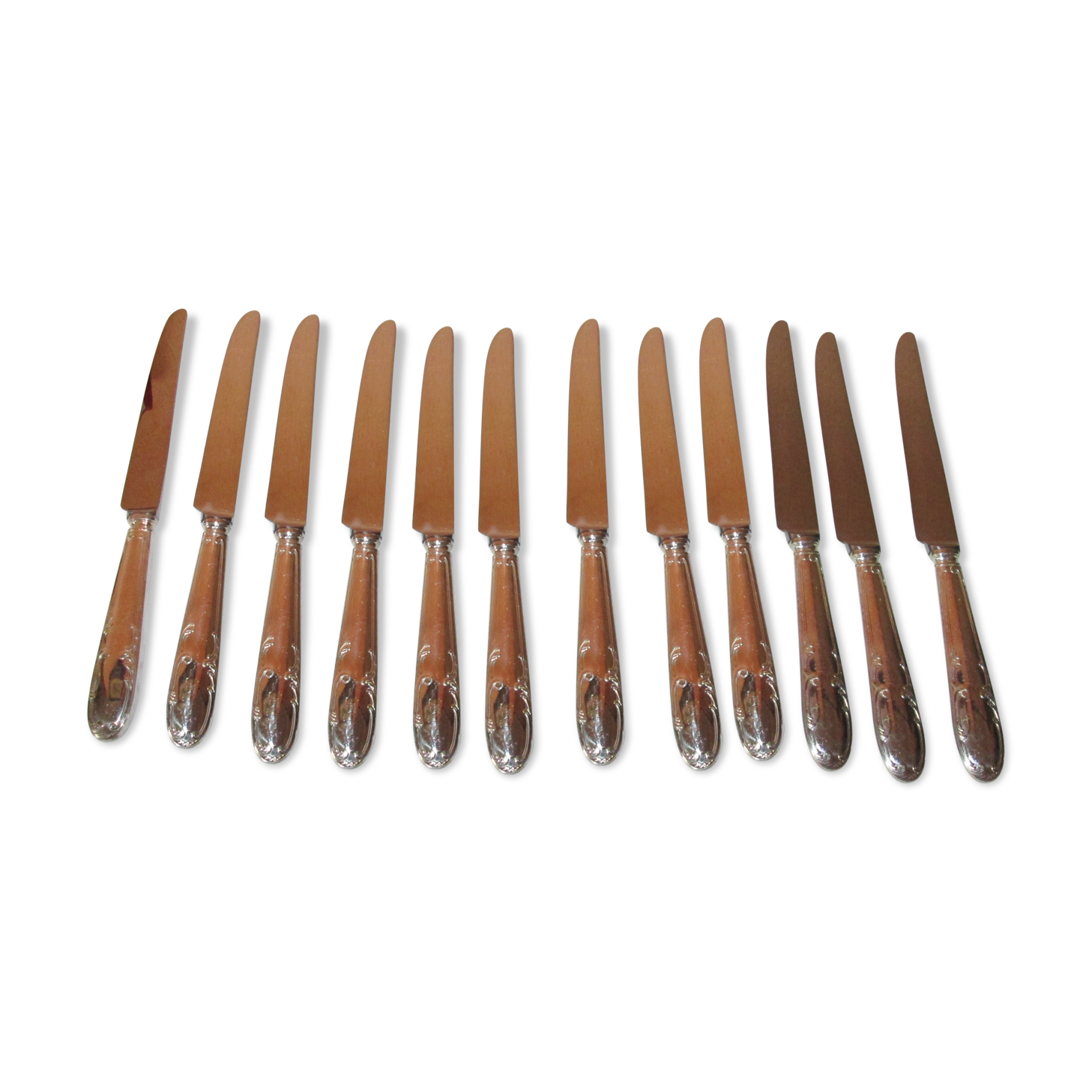 12 silver metal knives